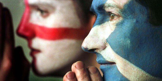 Edinburgh football fans Mark Roberts (right) and David Johns hope for the best for their teams, in the Euro 2000 Championship playoff football match between England and Scotland at Hampden Park stadium, Glasgow, on 13/11/99.