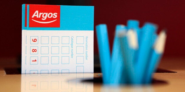 Product order forms and pencils sit on display at an Argos store, operated by Home Retail Group Plc, in Enfield, U.K. on Wednesday, Sept. 7, 2011. Home Retail Group Plc (HOME), owner of the U.K. catalog chain Argos, agreed to buy rights to the Habitat brand in the U.K. and Ireland along with three London stores after the furniture retailer was placed into administration. Photographer: Chris Ratcliffe/Bloomberg via Getty Images