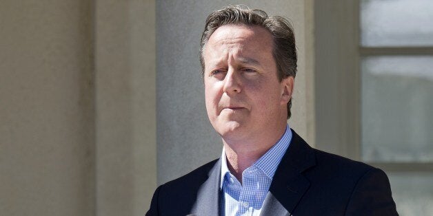 British Prime Minister David Cameron addresses the media during a joint press conference with German Chancellor, Dutch Prime Minister and Swedish Prime minister in front of the summer residence of the Swedish Prime Minister in Harpsund, 120km west of Stockholm on June 10, 2014. The Swedish Prime Minister hosted German Chancellor Angela Merkel, British Prime Minister David Cameron and Dutch Prime Minister Mark Rutte for talks on the EU and the new European Parliament on June 9 to 10, 2014.AFP PHOTO/JONATHAN NACKSTRAND (Photo credit should read JONATHAN NACKSTRAND/AFP/Getty Images)