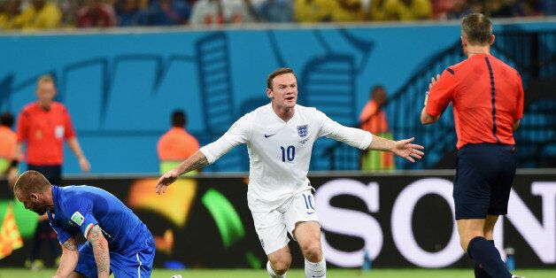 MANAUS, BRAZIL - JUNE 14: Wayne Rooney of England reacts towards the referee during the 2014 FIFA World Cup Brazil Group D match between England and Italy at Arena Amazonia on June 14, 2014 in Manaus, Brazil. (Photo by Claudio Villa/Getty Images)