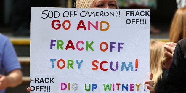Anti-fracking protesters outside as Prime Minister, David Cameron visited the Wigan Youth Zone boys and girls club.