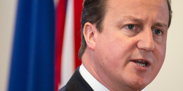 British Prime Minister David Cameron addresses the media at the end of a two-day EU summit at the European Council building in Brussels, Friday, Dec. 20 2013. European Union leaders gave an enthusiastic thumbs-up Thursday to a new mechanism agreed on to handle ailing banks, but analysts likened it to a band aid that falls short of what is needed to stabilize the bloc's financial system. (AP Photo/Geert Vanden Wijngaert)