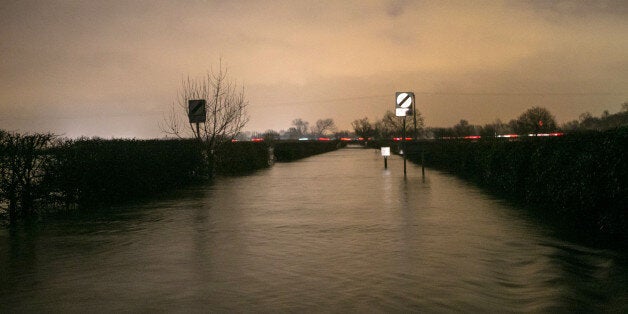 Godstow Road in Wytham near Oxford where a 70-year-old man died in floodwater whilst riding his bike.