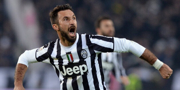 TURIN, ITALY - JANUARY 05: Mirko Vucinic of FC Juventus celebrates scoring the third goal during the Serie A match between Juventus and AS Roma at Juventus Arena on January 5, 2014 in Turin, Italy. (Photo by Claudio Villa/Getty Images)