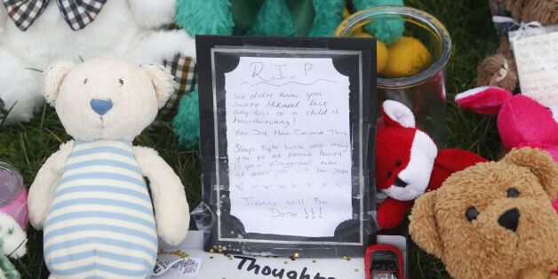 Tributes are left at Ferry Gait Crescent in Edinburgh, Scotland, near the home of three year old Mikaeel Kular: Danny Lawson/PA Wire