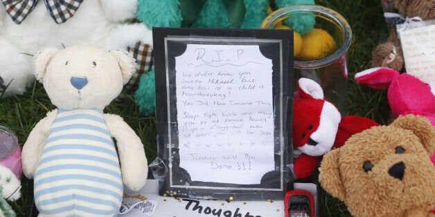 Tributes are left at Ferry Gait Crescent in Edinburgh, Scotland, near the home of three year old Mikaeel Kular: Danny Lawson/PA Wire