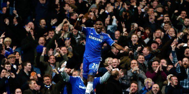Chelsea's Cameroonian striker Samuel Eto'o celebrates scoring his third goal and completing his hattrick during the English Premier League football match between Chelsea and Manchester United at Stamford Bridge in London on January 19, 2014. AFP PHOTO / ADRIAN DENNISRESTRICTED TO EDITORIAL USE. No use with unauthorized audio, video, data, fixture lists, club/league logos or live services. Online in-match use limited to 45 images, no video emulation. No use in betting, games or single club/league/player publications. (Photo credit should read ADRIAN DENNIS/AFP/Getty Images)