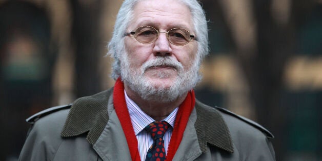 DJ Dave Lee Travis arrives at Southwark Crown Court in London where he is accused of a series of indecent assaults and one sexual assault.