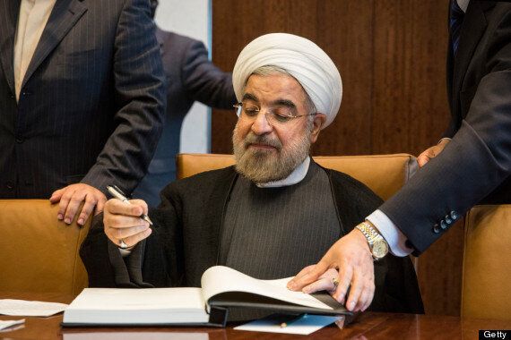 Ahmadinejad out, Rouhani in