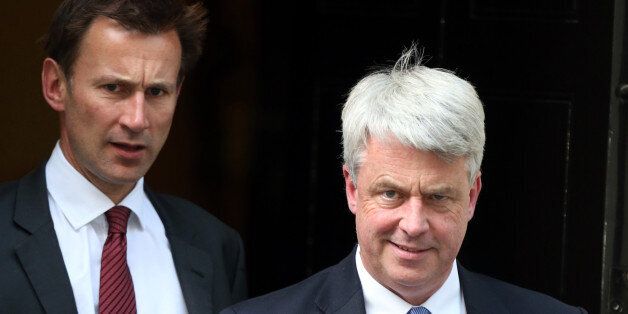 NOTE ALTERNATE CROP.Health secretary Jeremy Hunt (left) and Leader of the Commons Andrew Lansley leave a cabinet meeting at Downing Street in London, after Prime Minister David Cameron hailed his new-look top team, insisting he had put the right people in place to kick start the flagging economy.