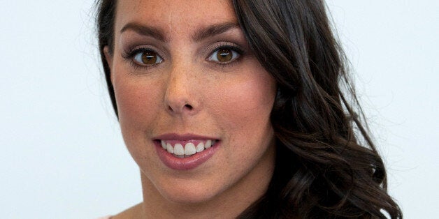 LONDON, UNITED KINGDOM - AUGUST 06: Gymnast Beth Tweddle attends a photocall after announcing her retirement at Chobham Academy on August 6, 2013 in London, England. (Photo by John Phillips/UK Press via Getty Images)