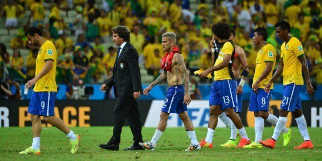 Brazil's player react after a Group A football match between Brazil and Mexico in the Castelao Stadium in Fortaleza during the 2014 FIFA World Cup on June 17, 2014. AFP PHOTO / YURI CORTEZ (Photo credit should read YURI CORTEZ/AFP/Getty Images)