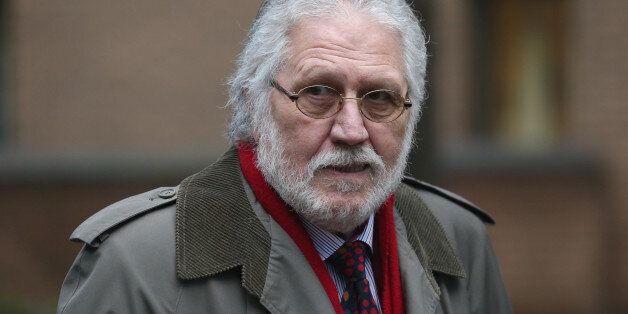 LONDON, ENGLAND - JANUARY 20: Radio presenter Dave Lee Travis arrives at Southwark Crown Court on January 20, 2014 in London, England. Dave Lee Travis, whose real name is David Patrick Griffin, is charged with 14 counts of indecent assaults and one of sexual assault, which allegedly took place between 1977 and 2007 against victims aged between 15 and 29. Dave Lee Travis entered a not guilty plea to the charges in October last year. (Photo by Oli Scarff/Getty Images)