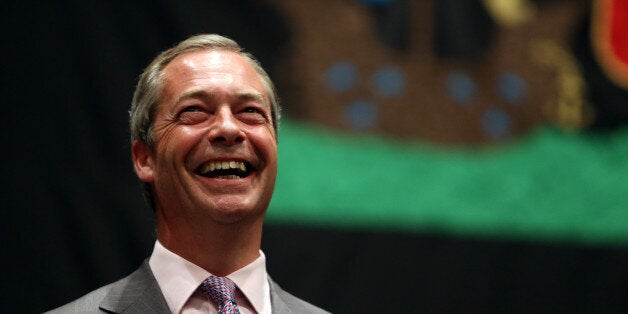 UK Independence Party leader Nigel Farage smiles as he hears the results during the European Parliamentary elections count at the Guildhall in Southampton, Hampshire.