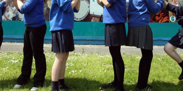 Undated file photos of children wearing their school uniform