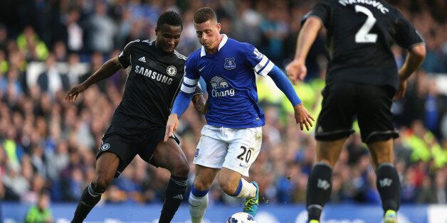 LIVERPOOL, ENGLAND - SEPTEMBER 14: Ross Barkley of Everton competes with John Obi Mikel of Chelsea during the Barclays Premier League match between Everton and Chelsea at Goodison Park on September 14, 2013 in Liverpool, England. (Photo by Clive Brunskill/Getty Images)