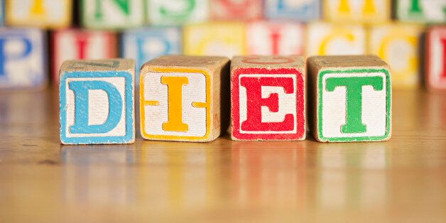 Vintage kids alphabet blocks spelling DIET
