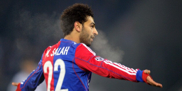 Basel's Egyptian midfielder Mohamed Salah celebrates scoring a goal during the UEFA Champions League group E football match between Basel and Chelsea at St Jakob Park in Basel on November 26, 2013. AFP PHOTO / SEBASTIEN BOZON (Photo credit should read SEBASTIEN BOZON/AFP/Getty Images)