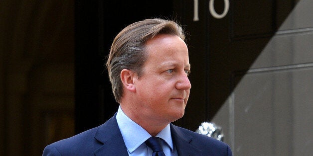 British Prime Minister, David Cameron awaits the arrival of the King of Bahrain, Sheikh Hamad bin Issa Al-Khalifah to Downing street in central London on August 6, 2013. AFP PHOTO / BEN STANSALL (Photo credit should read BEN STANSALL/AFP/Getty Images)