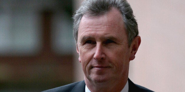 PRESTON, LANCASHIRE - JANUARY 24: Former Deputy Speaker Nigel Evans arrives at Preston Crown Court for a a pre-trial hearing to face charges of sexual assault on January 24, 2014 in Preston, Lancashire. Mr Evans resigned from his position as the House of Commons deputy speaker last year. The MP for Ribble Valley has been charged with two counts of indecent assault, five of sexual assault, and one of rape against seven alleged male victims. (Photo by Christopher Furlong/Getty Images)