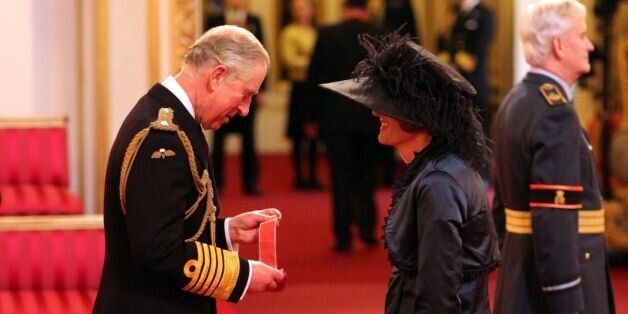 Artist Grayson Perry is made a CBE by the Prince of Wales during an investiture ceremony at Buckingham Palace, London.