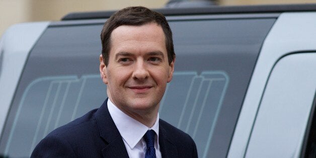 Britain's Chancellor of the Exchequer, George Osborne, arrives at Lancaster House for a UK/China Financial Forum in London on June 18, 2014. AFP PHOTO / ANDREW COWIE (Photo credit should read ANDREW COWIE/AFP/Getty Images)