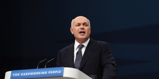 MANCHESTER, ENGLAND - OCTOBER 01: Iain Duncan Smith, the Secretary of State for Work and Pensions, delivers his speech in the Main Hall of Manchester Central on the third day, and penultimate day, of the Conservative Party Conference on October 1, 2013 in Manchester, England. David Cameron has unveiled a Government pilot scheme for GP surgeries to open from 8am until 8pm seven days, backed by 50 million GBP of funding. (Photo by Oli Scarff/Getty Images)