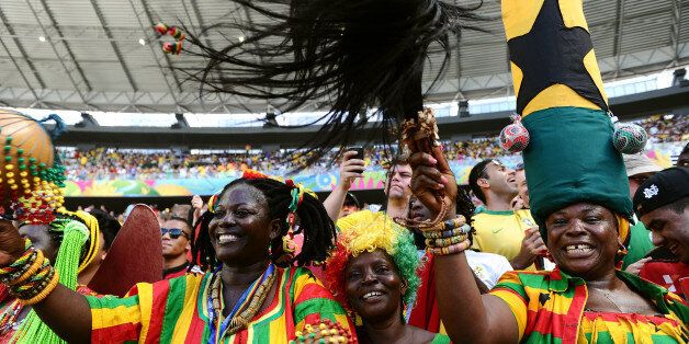 Ghana fans soak up the atmosphere in the stands at the Estadio Castelao