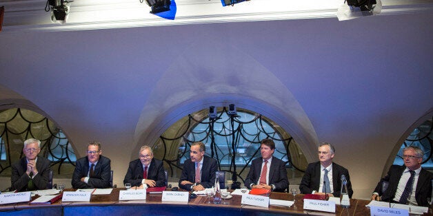 L-R) Martin Weale, a monetary policy committee member at the Bank of England, Spencer Dale, chief economist at the Bank of England, Charles Bean, deputy governor of the Bank of England, Mark Carney, governor of the Bank of England, Paul Tucker, outgoing deputy governor of the Bank of England, Paul Fisher, markets director at the Bank of England, David Miles, a monetary policy committee member at the Bank of England, attend a monetary policy committee (MPC) briefing inside the central bank's head