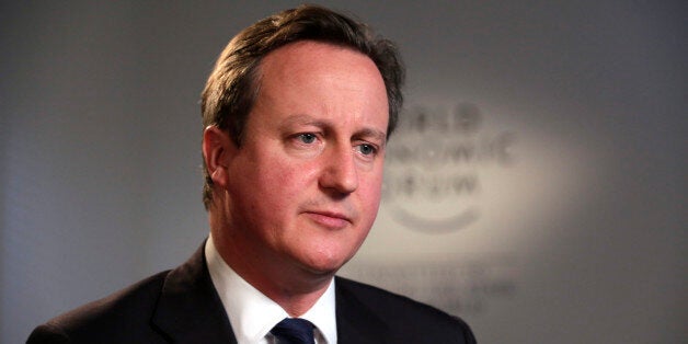 David Cameron, U.K. prime minister, pauses during a Bloomberg Television interview on day three of the World Economic Forum (WEF) in Davos, Switzerland, on Friday, Jan. 24, 2014. World leaders, influential executives, bankers and policy makers attend the 44th annual meeting of the World Economic Forum in Davos, the five day event runs from Jan. 22-25. Photographer: Jason Alden/Bloomberg via Getty Images