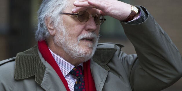 DJ Dave Lee Travis arrives at Southwark Crown Court in London where he is accused of a series of indecent assaults and one sexual assault.