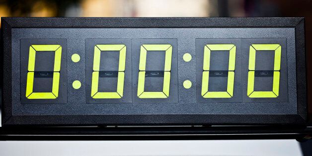 Digital timing clock at start line of marathon race.