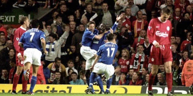 Kevin Campbell celebrates his winner in front of the Kop in 1999