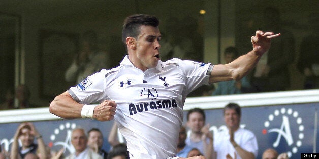 Tottenham Hotspur's Welsh midfielder Gareth Bale celebrates scoring the winning goal during the English Premier League football match between Tottenham Hotspur and Sunderland at White Hart Lane in north London on May 19, 2013. Tottenham won the match 1-0. AFP PHOTO / IAN KINGTON RESTRICTED TO EDITORIAL USE. No use with unauthorized audio, video, data, fixture lists, club/league logos or ?live? services. Online in-match use limited to 45 images, no video emulation. No use in betting, games or s