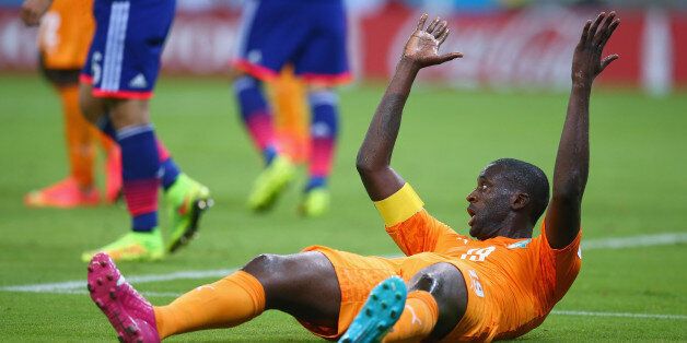 RECIFE, BRAZIL - JUNE 14: Yaya Toure of the Ivory Coast reacts during the 2014 FIFA World Cup Brazil Group C match between the Ivory Coast and Japan at Arena Pernambuco on June 14, 2014 in Recife, Brazil. (Photo by Julian Finney/Getty Images)