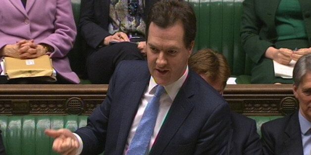 Chancellor of the Exchequer George Osborne answers an emergency question in the House of Commons on the loss of the UK's prized AAA credit rating.