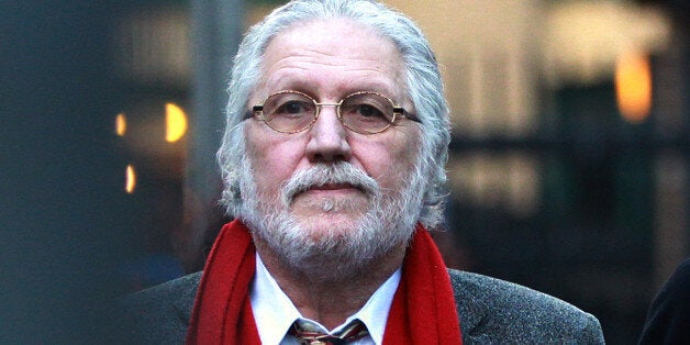 Former Radio 1 DJ Dave Lee Travis arrives for a pre-trial hearing at Southwark Crown Court in London where he faces sex charges.