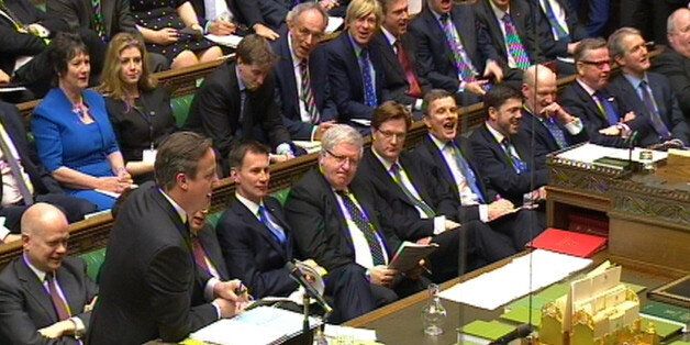 A view of the Government front bench as Prime Minister David Cameron speaks during Prime Minister's Questions in the House of Commons, London.