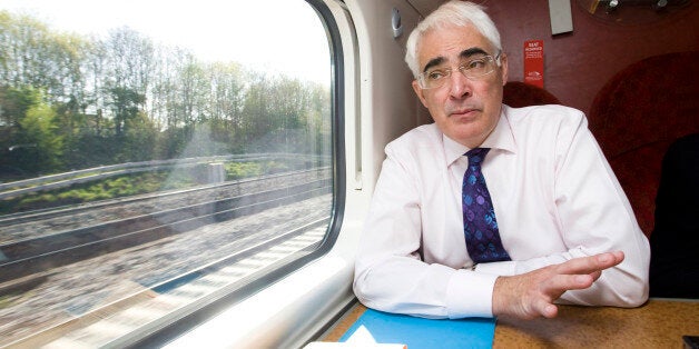 Alistair Darling, U.K. chancellor of the exchequer, speaks during an interview while travelling by train from London to Birmingham, U.K., on Tuesday, April 20, 2010. Darling rejected calls by opposition parties to suspend Goldman Sachs Group Inc. from working for the U.K. government until regulators complete a probe of the New York-based firm. Photographer: Chris Ratcliffe/Bloomberg via Getty Images