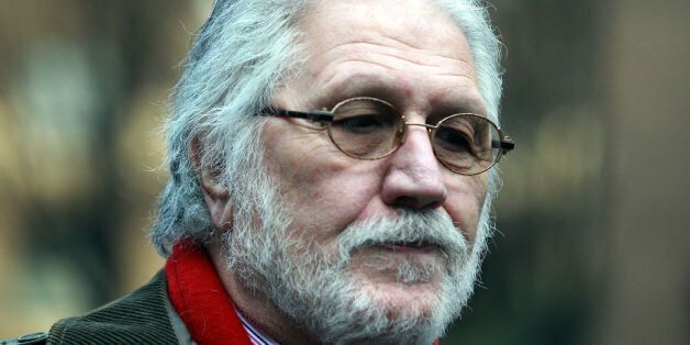 DJ Dave Lee Travis arrives at Southwark Crown Court in London where he is accused of a series of indecent assaults and one sexual assault.