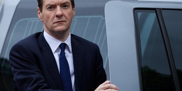 Britain's Chancellor of the Exchequer, George Osborne, arrives at Lancaster House for a UK/China Financial Forum in London on June 18, 2014. AFP PHOTO / ANDREW COWIE (Photo credit should read ANDREW COWIE/AFP/Getty Images)