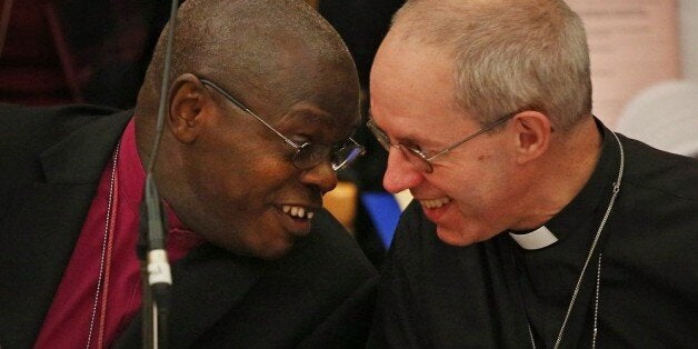 LONDON, ENGLAND - NOVEMBER 20: The Archbishop of York John Sentamu (L) talks to The Archbishop of Canterbury Justin Welby during the General Synod at Church House on November 20, 2013 in London, England. The Church of England's governing body, known as the General Synod, is holding meetings this week where the issue of the ordination of women bishops will be debated. (Photo by Peter Macdiarmid/Getty Images)