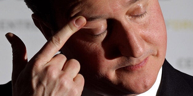 British Prime Minister David Cameron pauses as he delivers a speech on higher education funding in central London, on December 8, 2010 England. AFP PHOTO / OLI SCARFF / POOL (Photo credit should read OLI SCARFF/AFP/Getty Images)