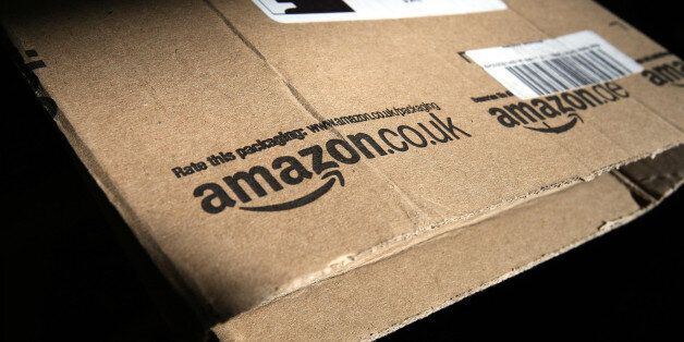 File photo dated 26/04/13 of the Amazon logo on a package. The online retail giant is to create 800 jobs before the end of the year as it gears up for the busy festive season.