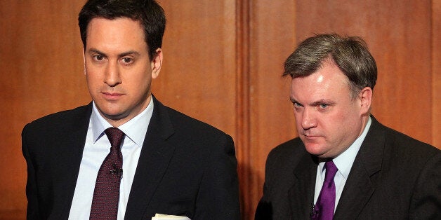 LONDON, ENGLAND - MARCH 14: Shadow Chancellor Ed Balls follows Labour Party Leader Ed Miliband from a press conference on March 14, 2011 in London, England. Mr Miliband set out Labour's demands for the budget which is due later this month. (Photo by Peter Macdiarmid/Getty Images)