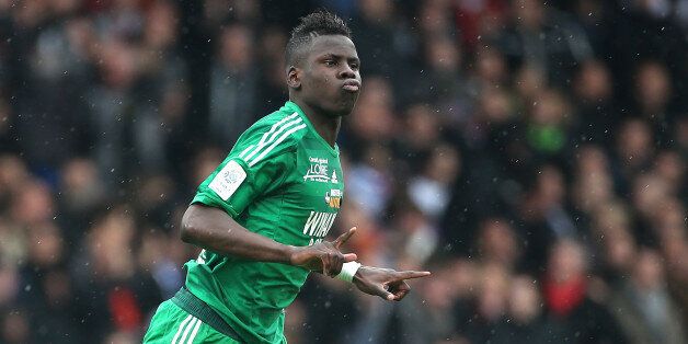 LYON, FRANCE - APRIL 28: Kurt Zouma of Saint-Etienne celebrates his goal during the Ligue 1 match between Olympique Lyonnais, OL, and AS Saint-Etienne, ASSE, at the Stade Gerland on April 28, 2013 in Lyon, France. (Photo by John Berry/Getty Images)