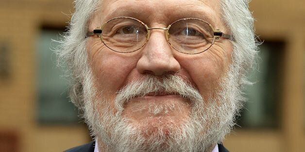 Former Radio 1 DJ Dave Lee Travis leaves Southwark Crown Court in south London, where he is charged with 13 counts of indecent assault dating back to between 1976 and 2003, and one count of sexual assault in 2008.
