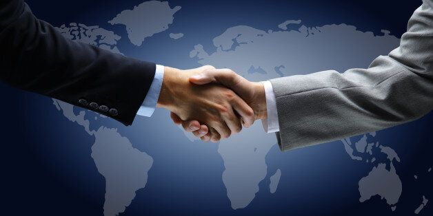 handshake with map of the world ...