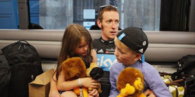 Wiggins relaxes with his children after Stage Twenty of the Le Tour de France 2012