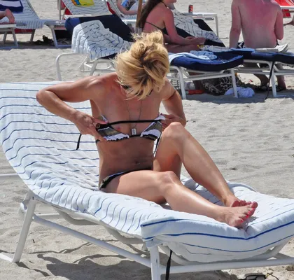 Mariah Carey Has Nip Slip on The Beach While With Her New Backup